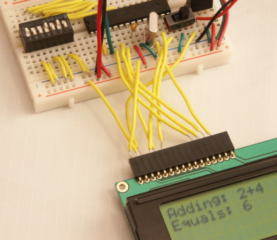 As your third electronics project in The NerdKits Guide, you'll put together an addition system using the included DIP switches.  This demonstrates how to use multiple inputs and bitwise arithmetic.