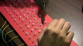 Close up of the assembly process. Here the a row wire is being soldered into place. Note: This kit requires soldering.